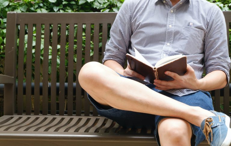 man reading book