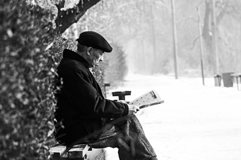 An Old Man Reads His Paper